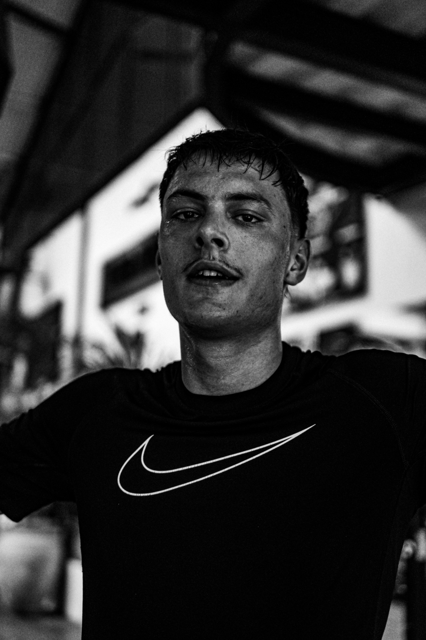 Close black-and-white portrait of Andri Casutt after training.