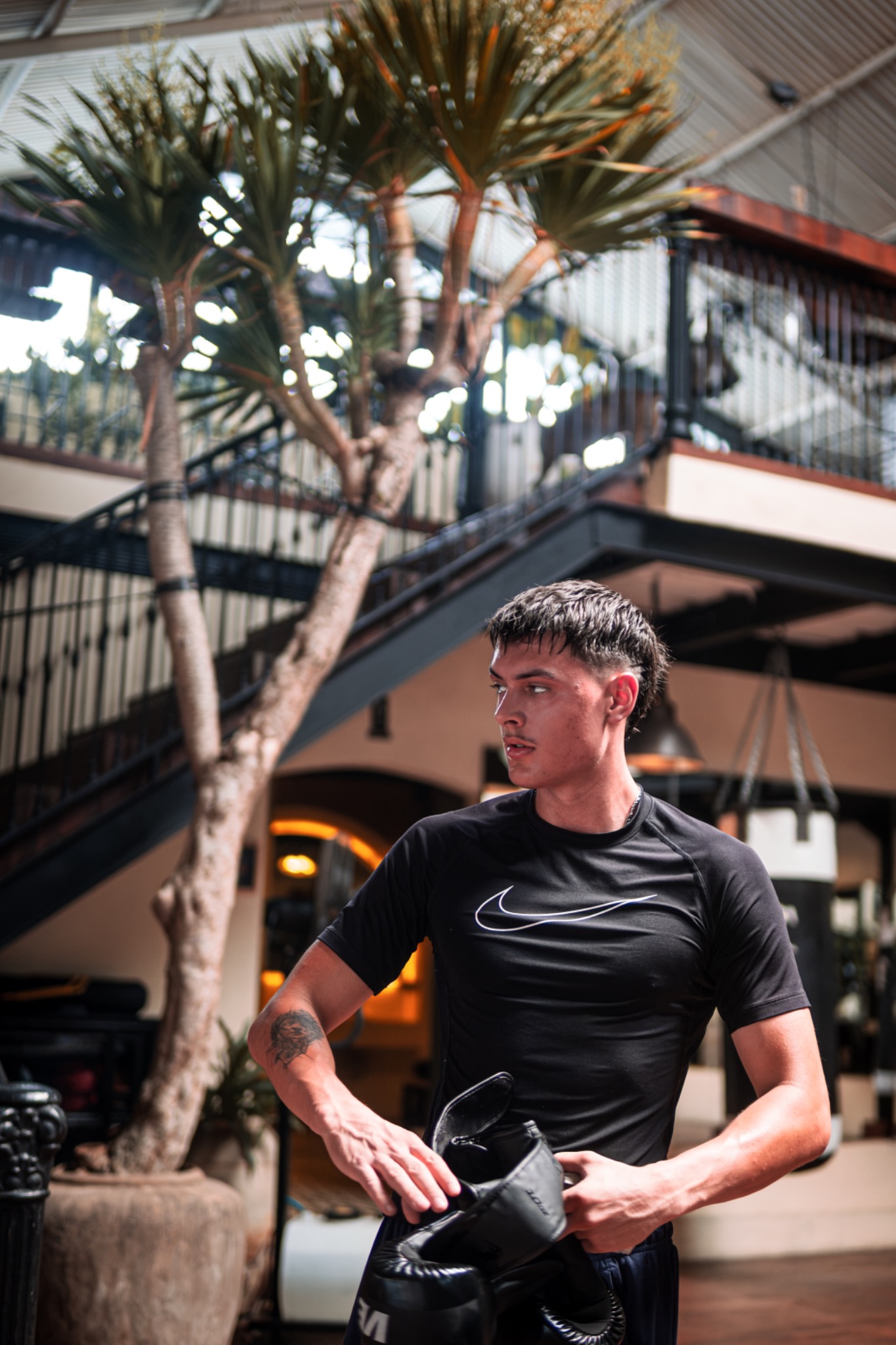 Andri Casutt standing outside the training ring in Bali.
